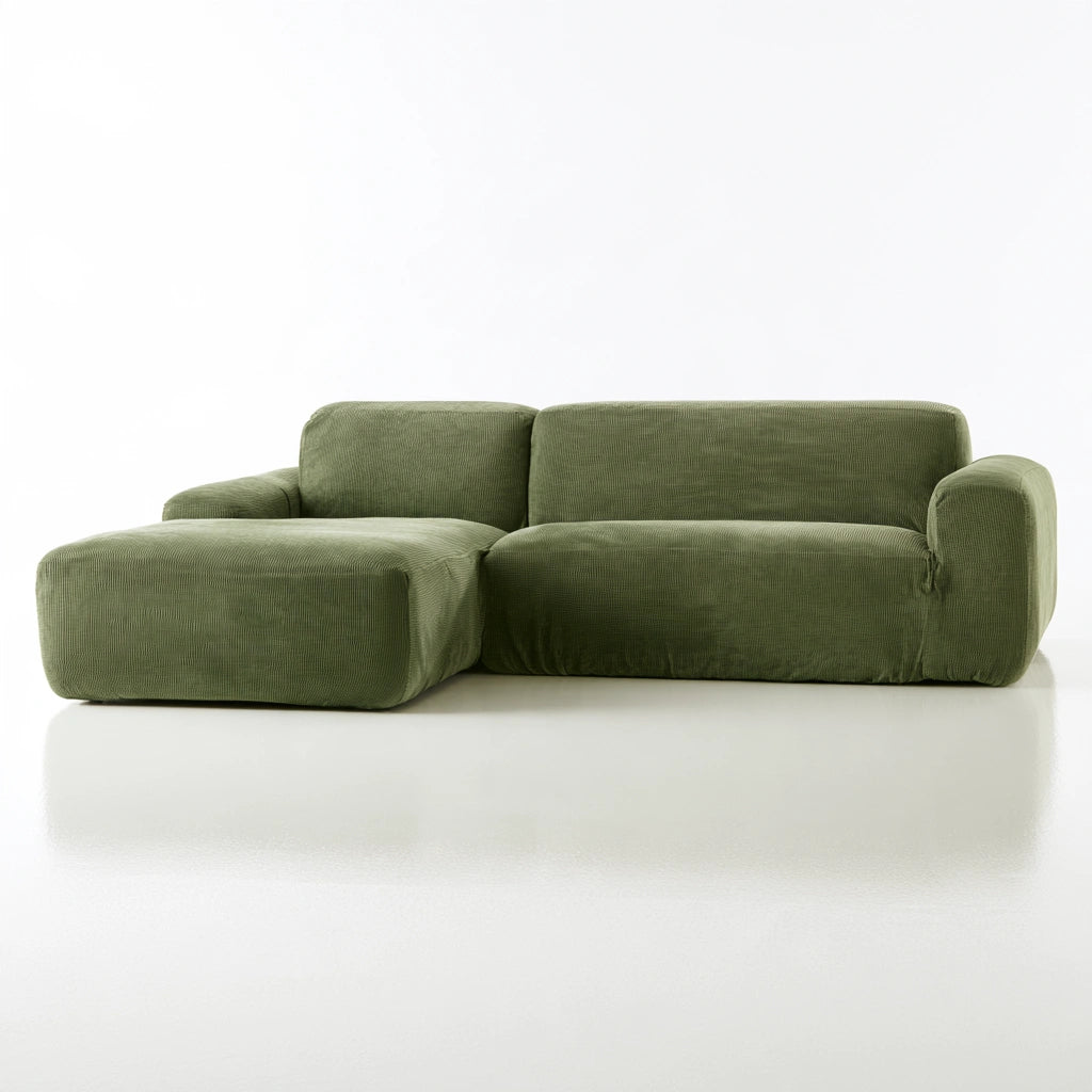 Modułowa szara sofa narożna marki elmandease w minimalistycznym wnętrzu, idealna do salonu, z wygodnym segmentem lewym.